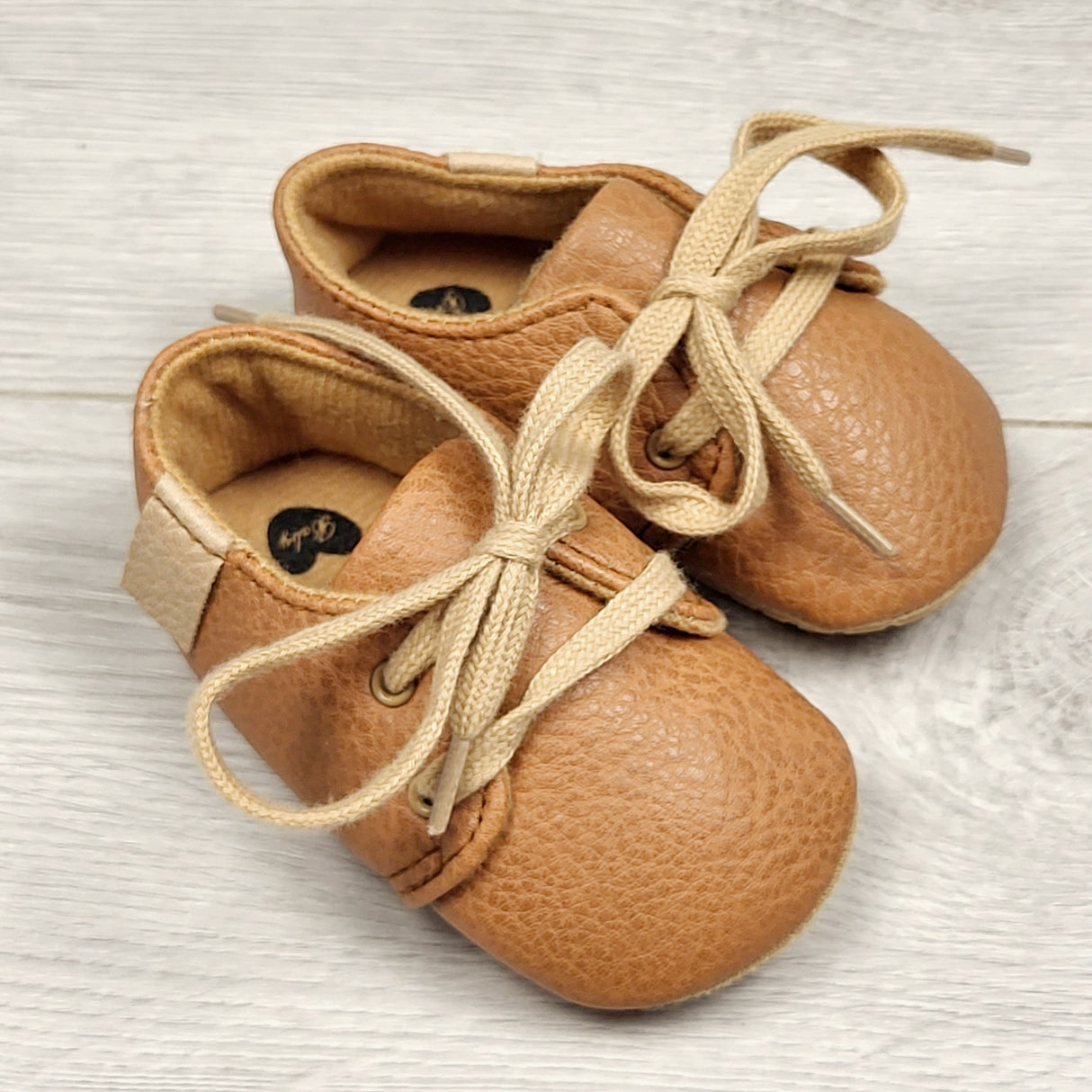 CCAM4 - Myggpp tan soft soled shoes with laces. Size like 0-6 months