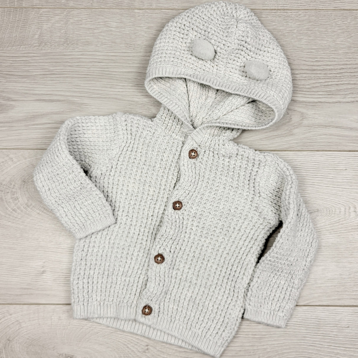 CCAM5 - Carters grey knit hooded cardigan. Size 6 months