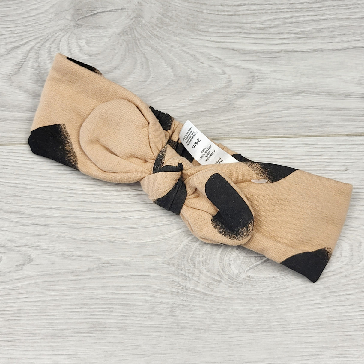 CTWN2 - PL Baby tan and black headband with bow. 🍁