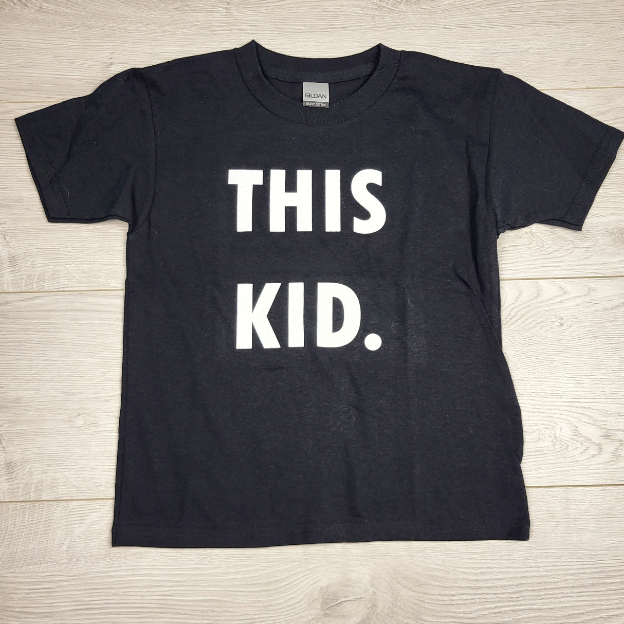 LHEP2 - This Kid brand black t-shirt. Size 6/7 🍁