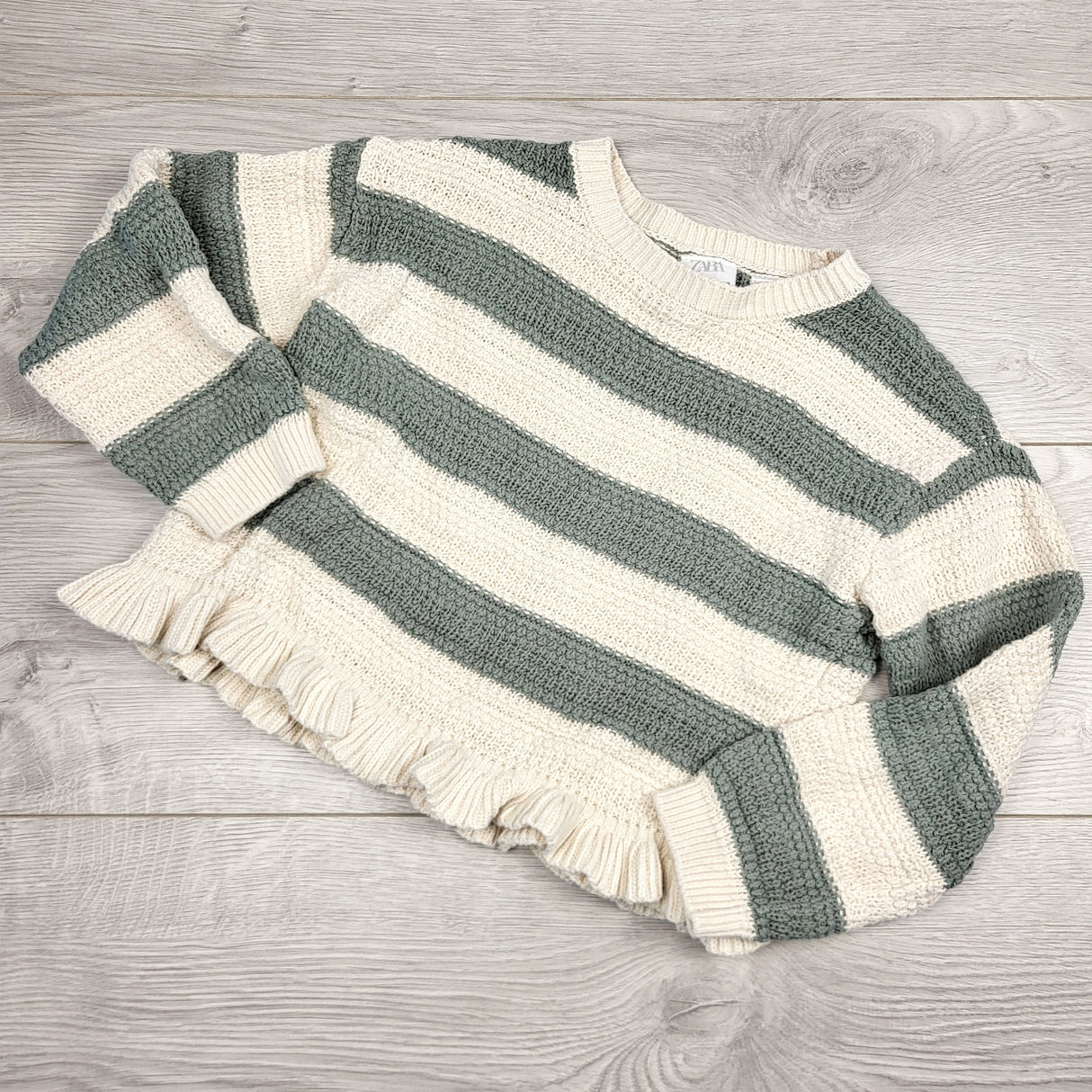 TSAM22 - Zara cream and green striped sweater with ruffle hem. Size 4/5T