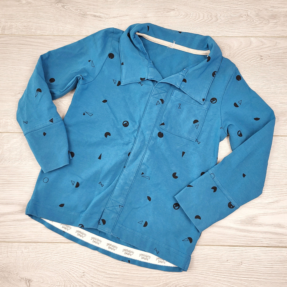 RBEN3 - Peekaboo Beans teal long sleeved top. Size 2T 🍁