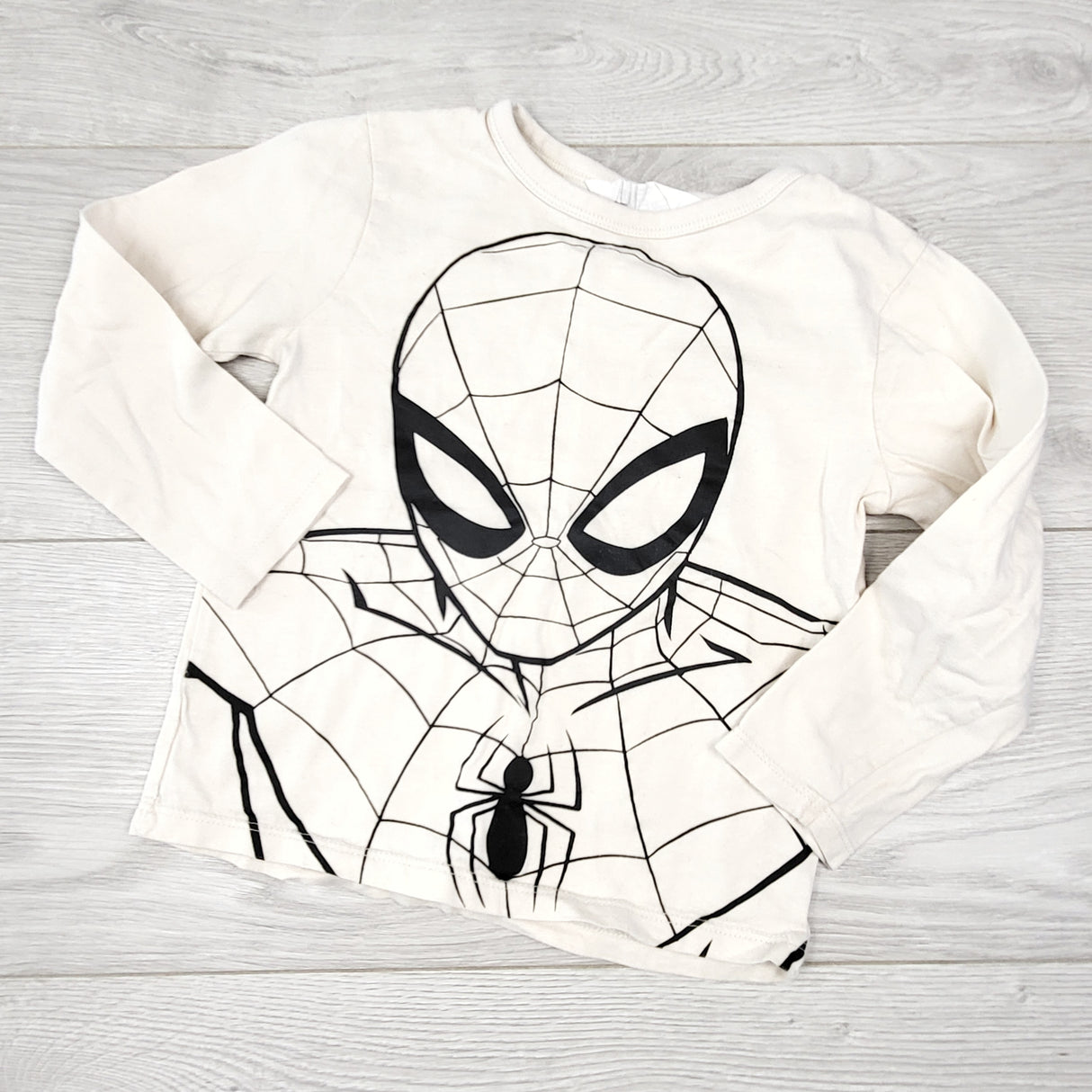 RBEN33 - H and M cream coloured Spider-man long sleeved top. Size 2-4T