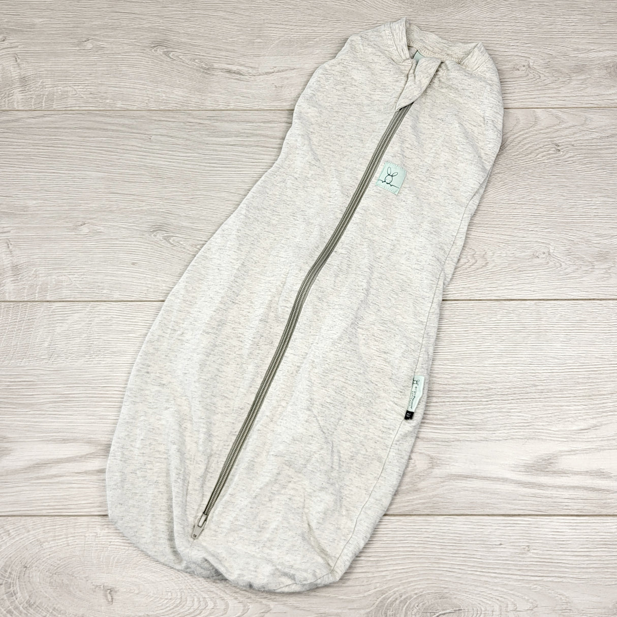 CCAM6 - ErgoPouch grey swaddle (arms can be in or out). Size 0-3 months