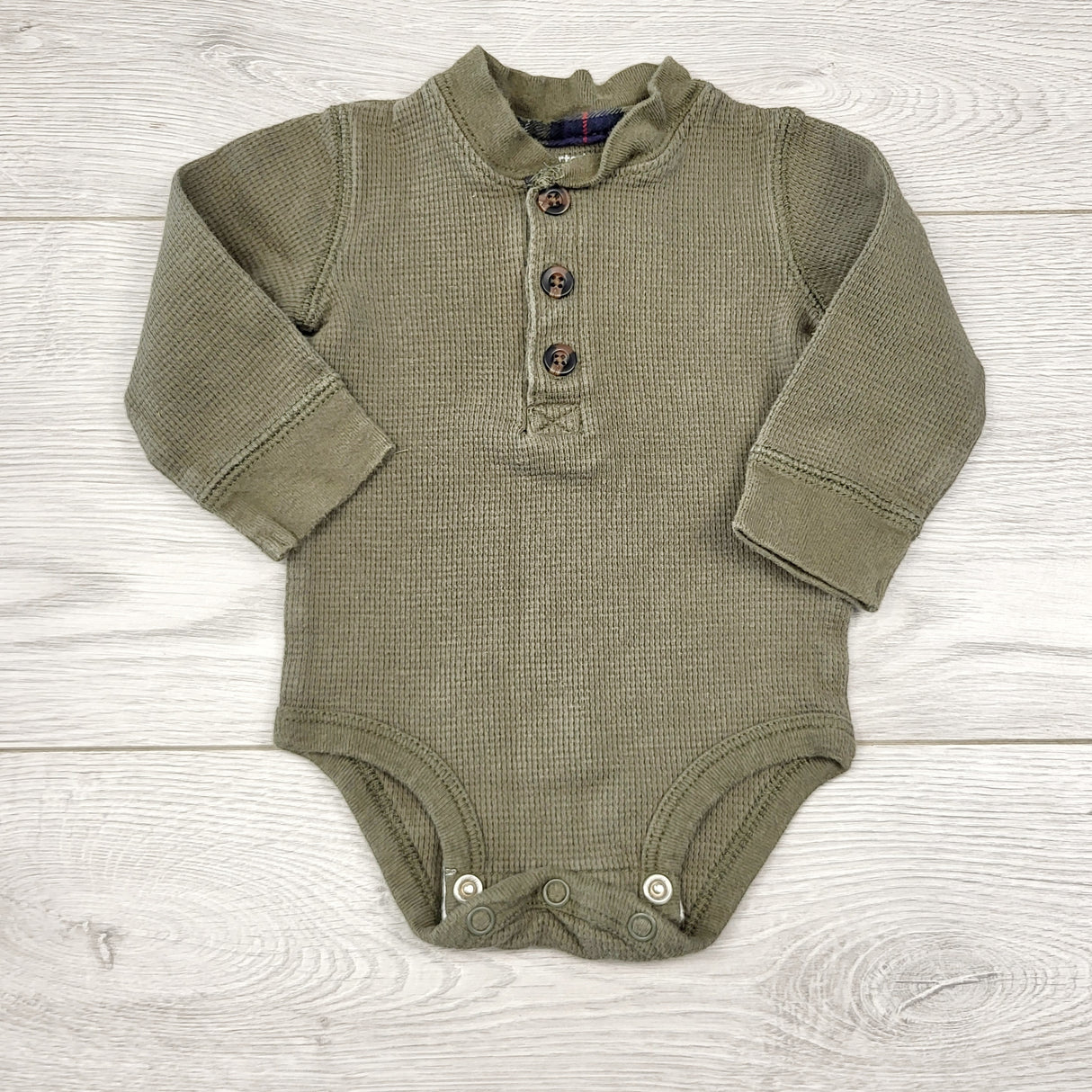 CCAM6 - Carters green waffle knit bodysuit. Size 6 months