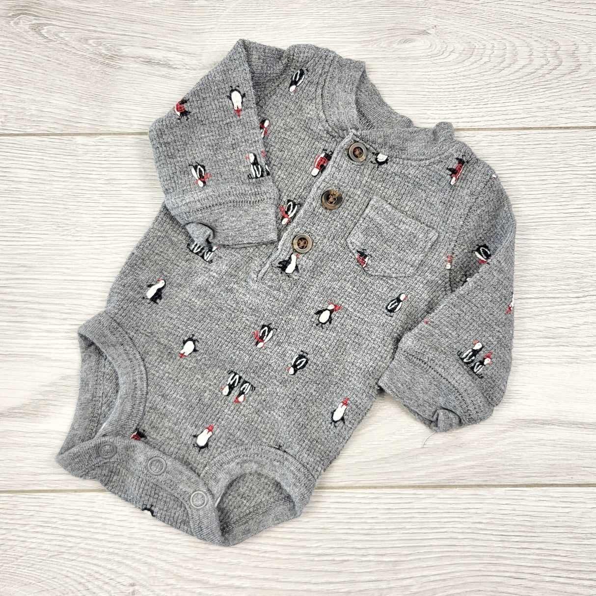 CCAM6 - Carters grey waffle knit bodysuit with penguins. Newborn size