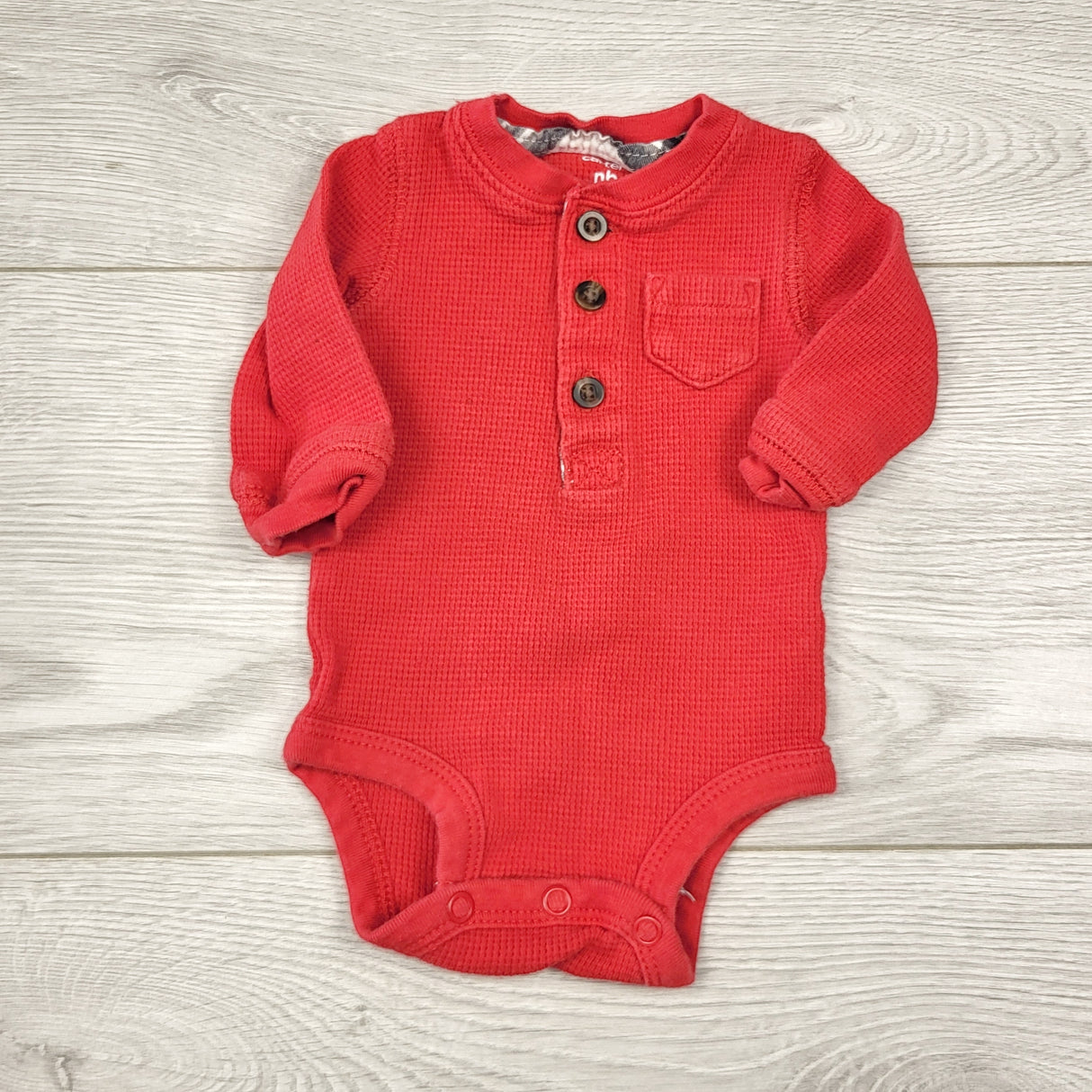 CCAM6 - Carters red waffle knit bodysuit. Newborn size