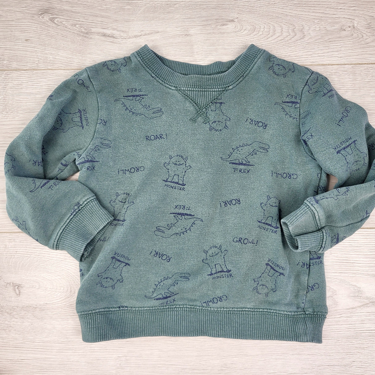 PRCH1 - Carters green sweatshirt with monsters and dinosaurs. Size 24 months