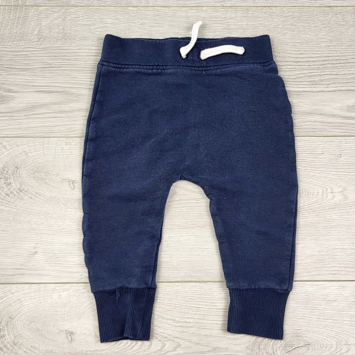 PRCH1 - Rise Little Earthling navy joggers. Size 6-12 months