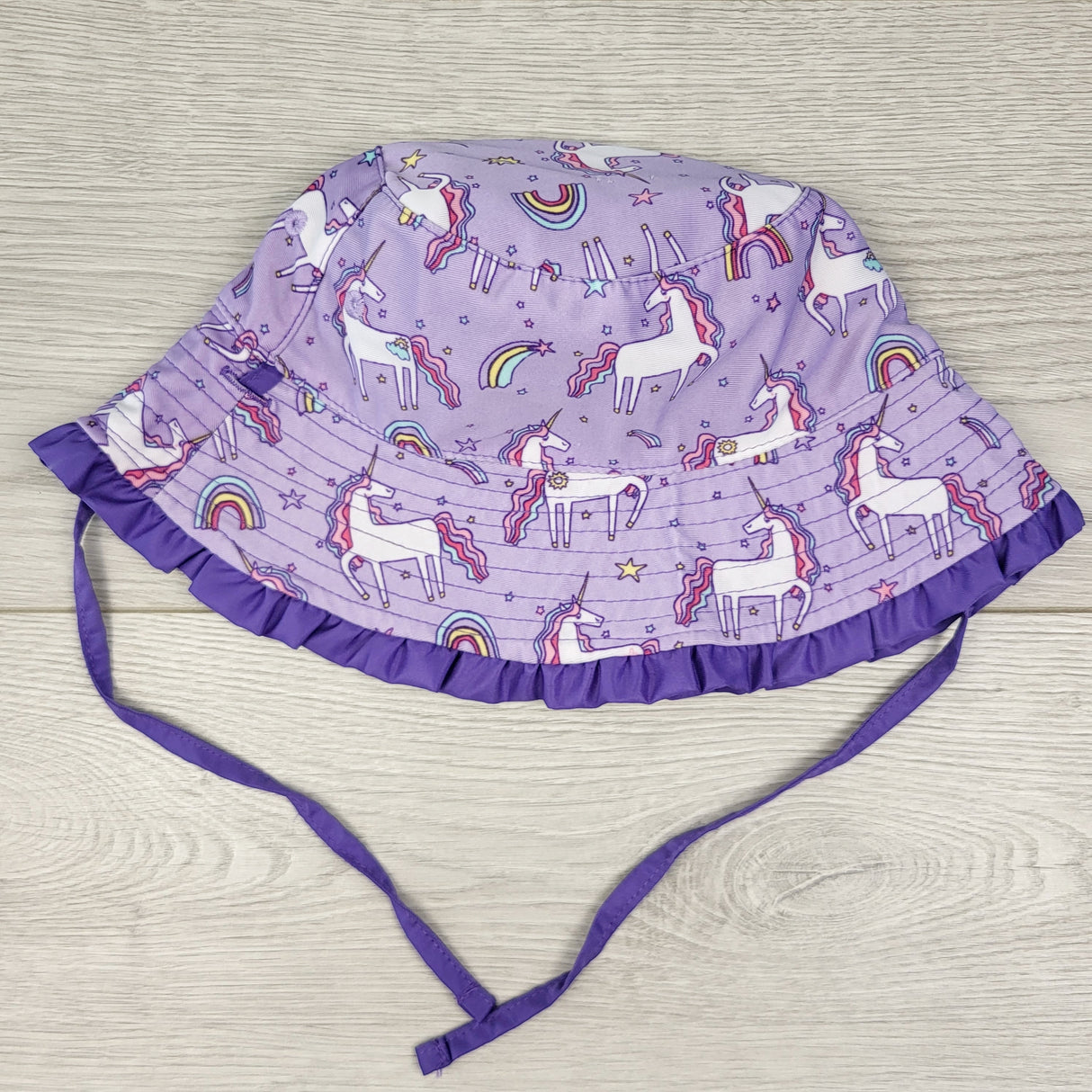 CTWN3 - Purple reversible bucket hat with unicorns. Approx 12-24 months