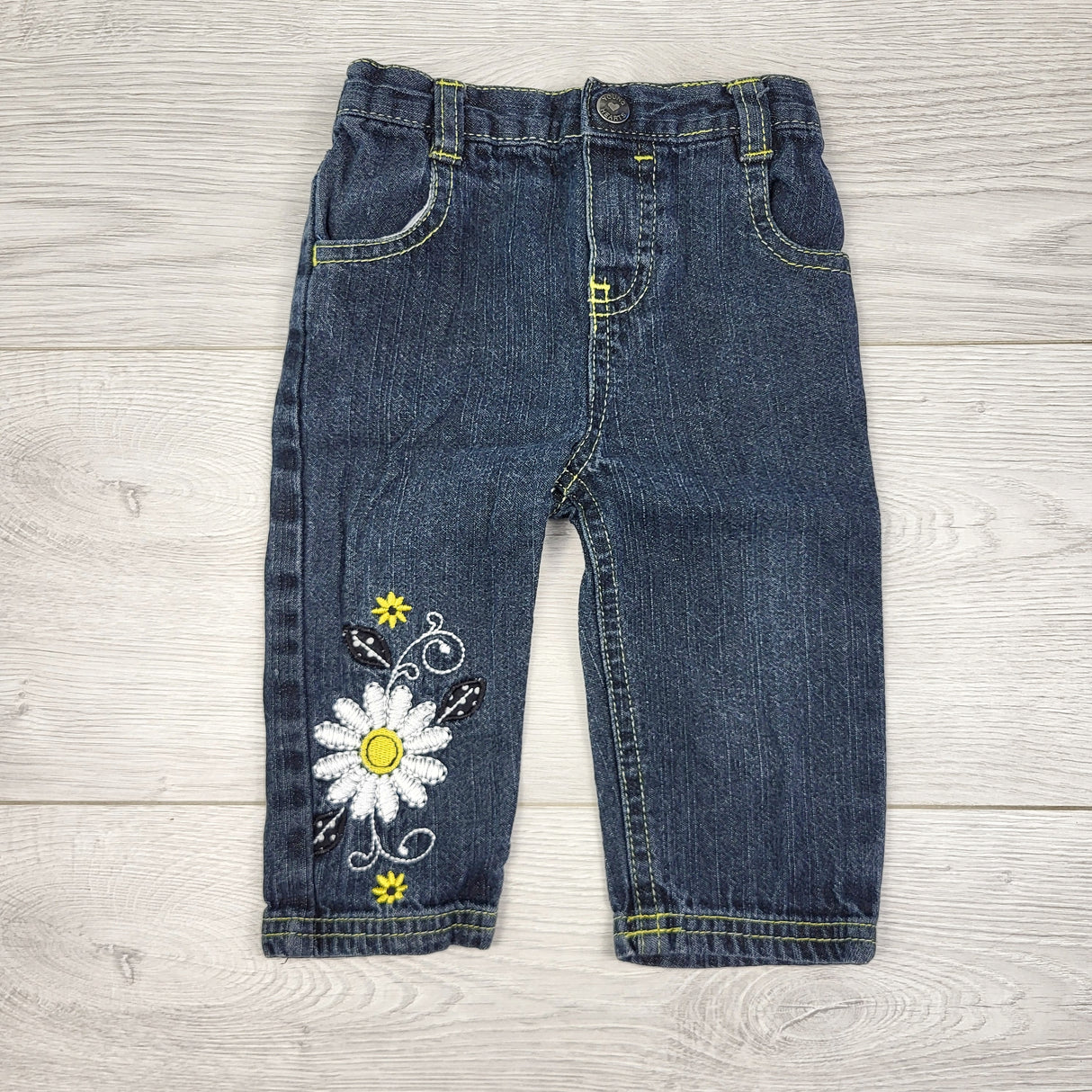 CTWN3 - Dark wash jeans with floral embroidery. Size 6-9 months