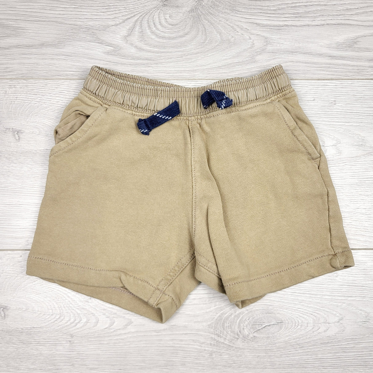 AWAT1 - Carters tan cotton shorts. Size 24 months