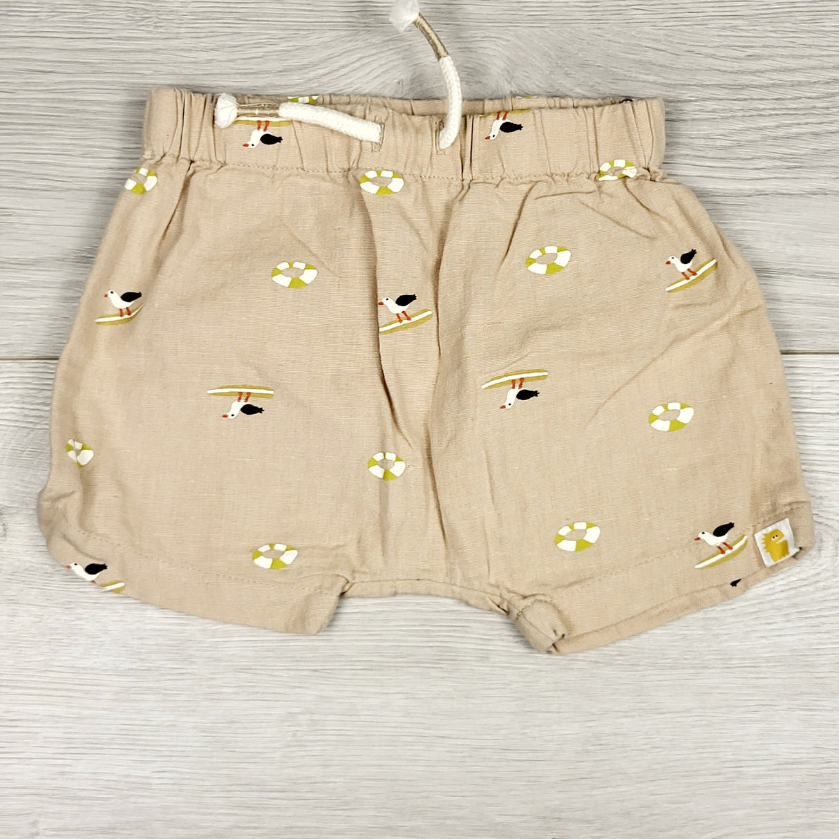 PRCH22 - Rise Little Earthling beige linen like shorts with seagulls. Size 6-9 months