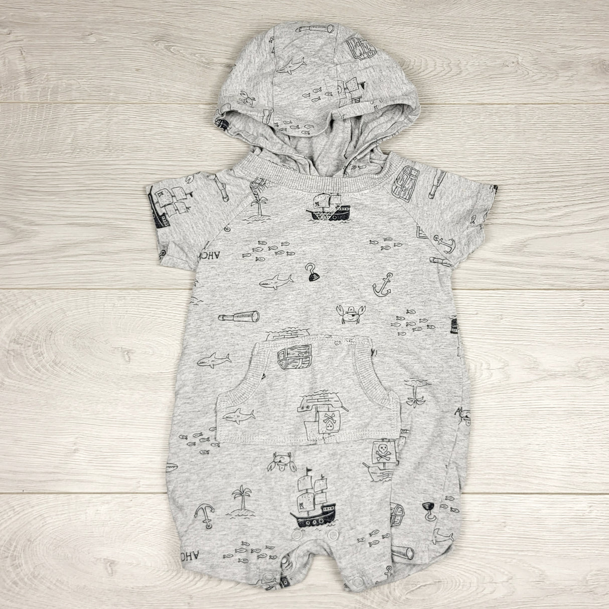 PRCH22 - Carters grey hooded romper with pirate theme. Size 12 months