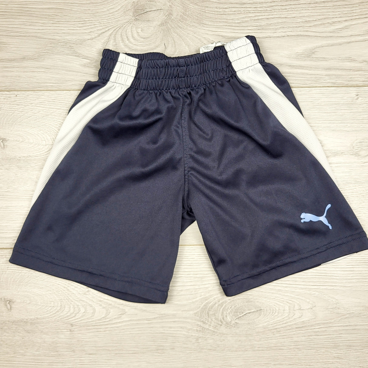 RMAZ1 - Puma navy and white striped active shorts. Size 3T