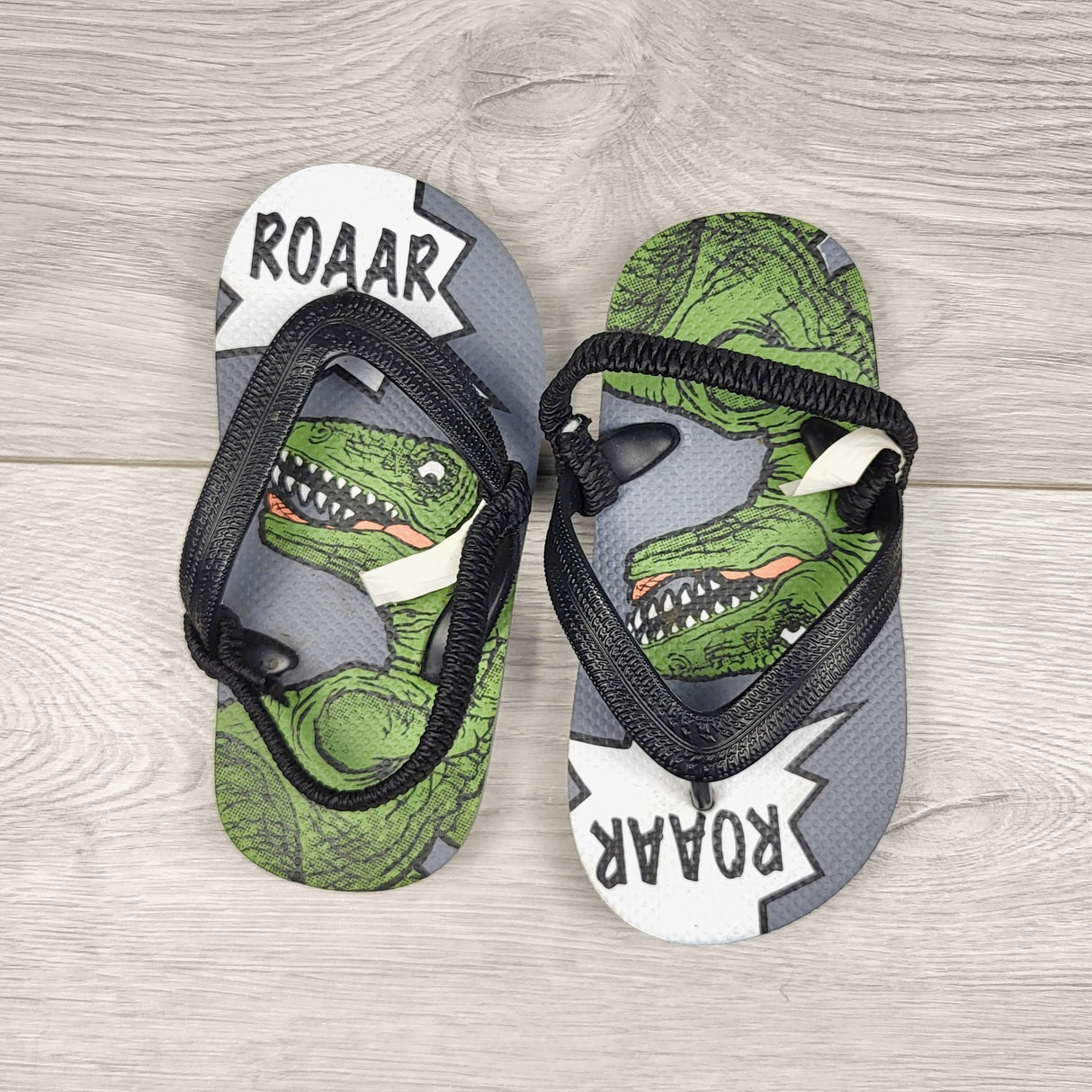 RMAZ1 - Dinosaur flip flop sandals. Size 8/9