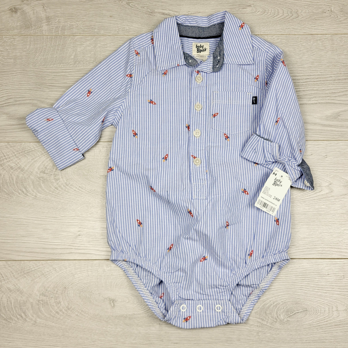 JRSH1 - NEW - Baby B'gosh blue striped button down bodysuit with rockets. Size 24 months