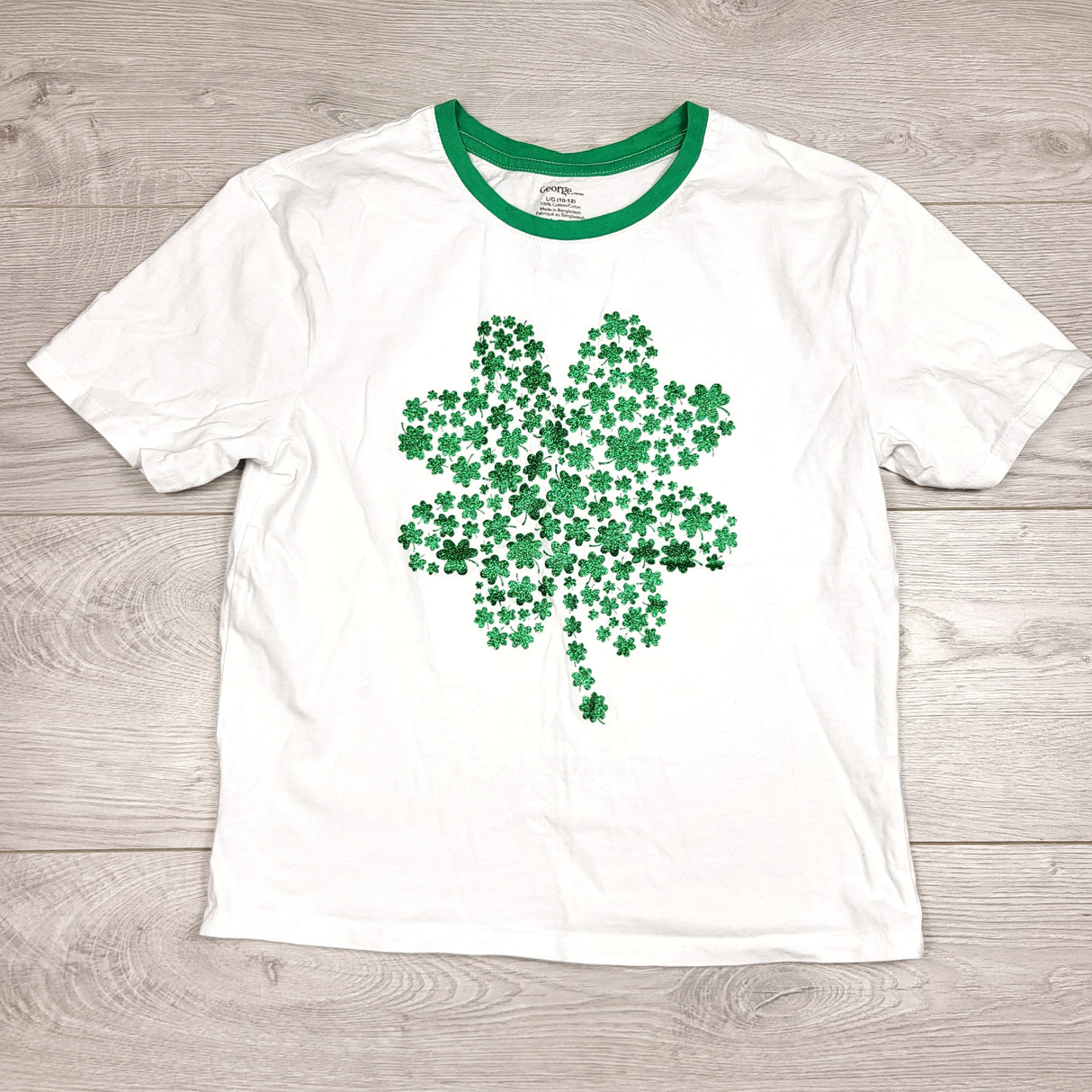 GFST1 - George white t-shirt with glitter shamrock. Size 10/12