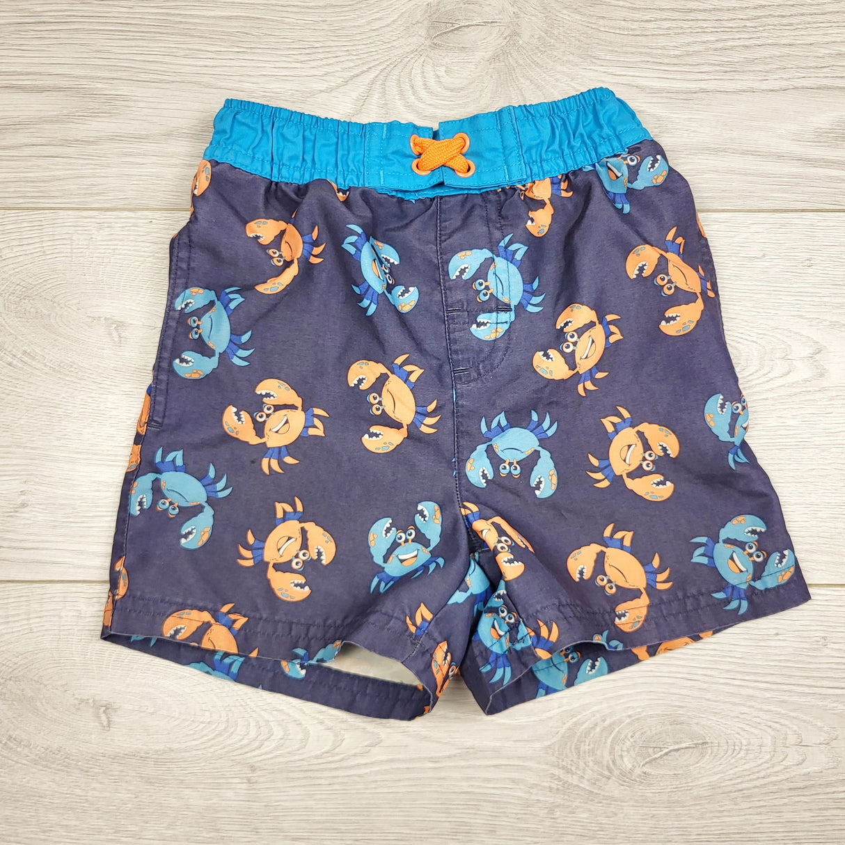 GFST1 - George navy swim shorts with crabs. Size 18-24 months