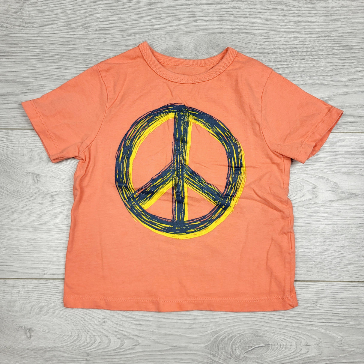 GFST1 - Children's Place salmon coloured t-shirt with peace sign. Size 12-18 months