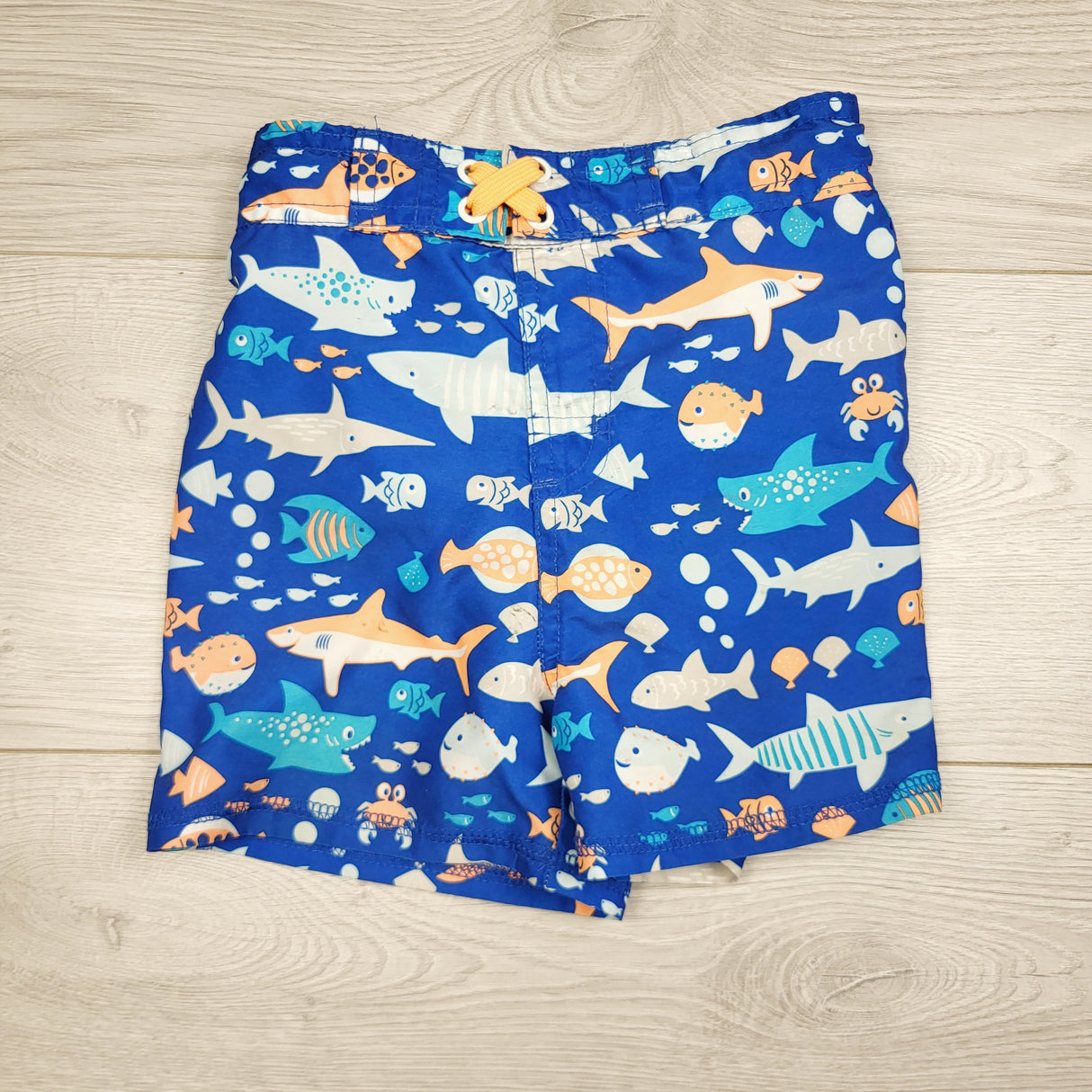 GFST1 - Mick Mack blue swim shorts with sharks. Size 24 months