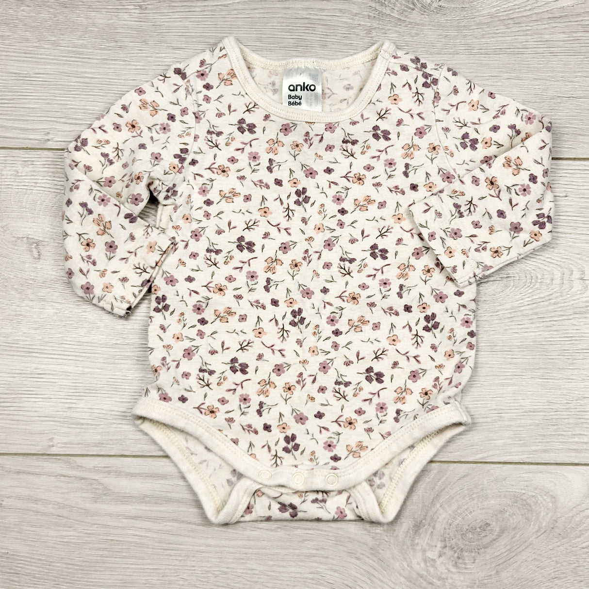 STMA1 - Anko cream coloured floral print bodysuit. Size 0-3 months