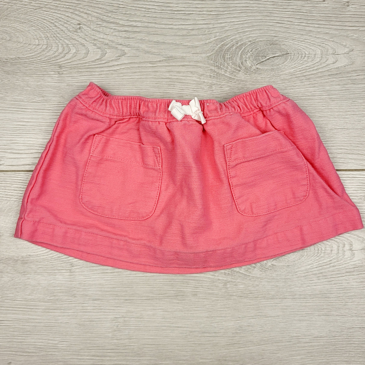 STMA1 - Carters pink woven skirt with built in diaper cover. Size 3 months