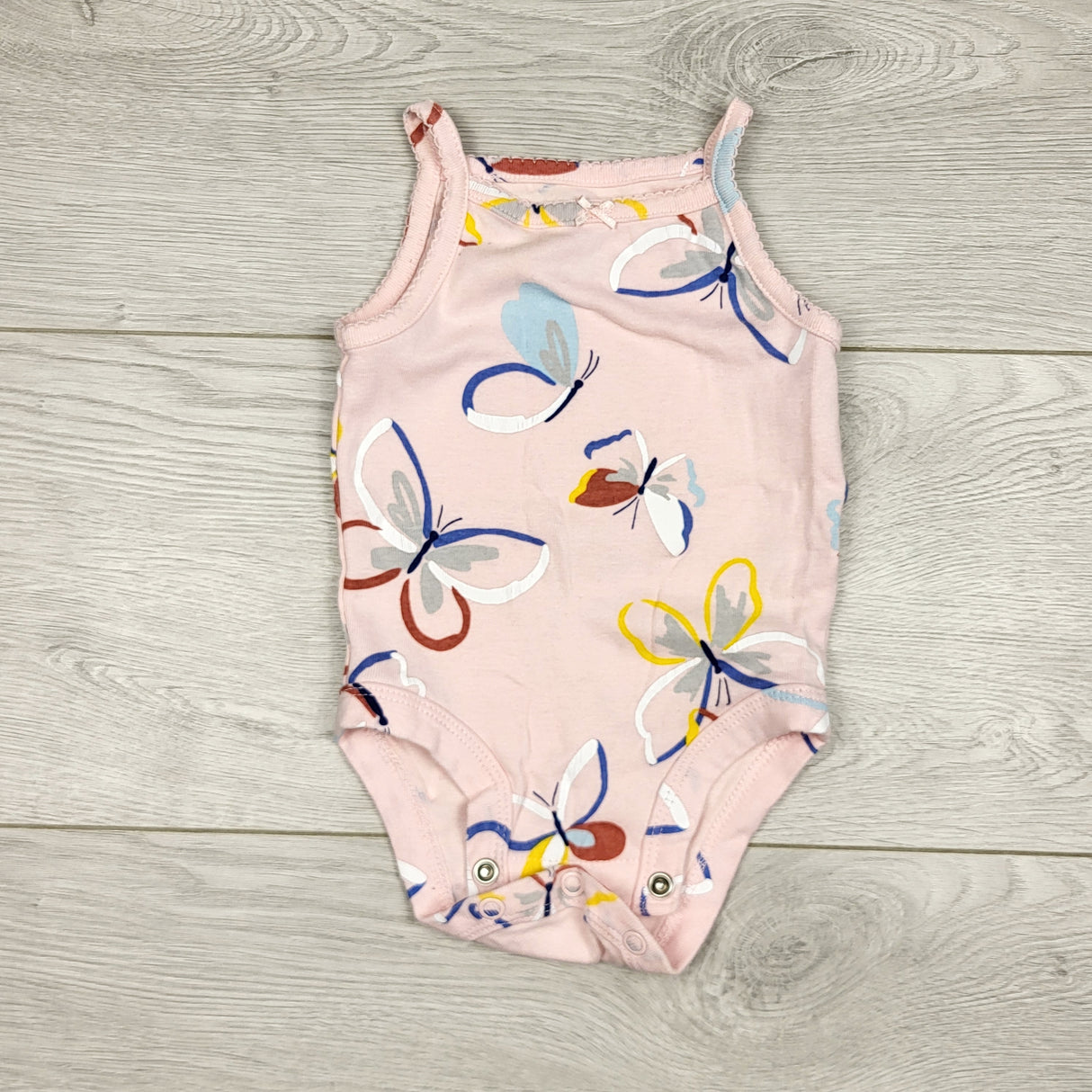 BBIN1 - Carters pink tank style bodysuit with butterflies. Size 3 months