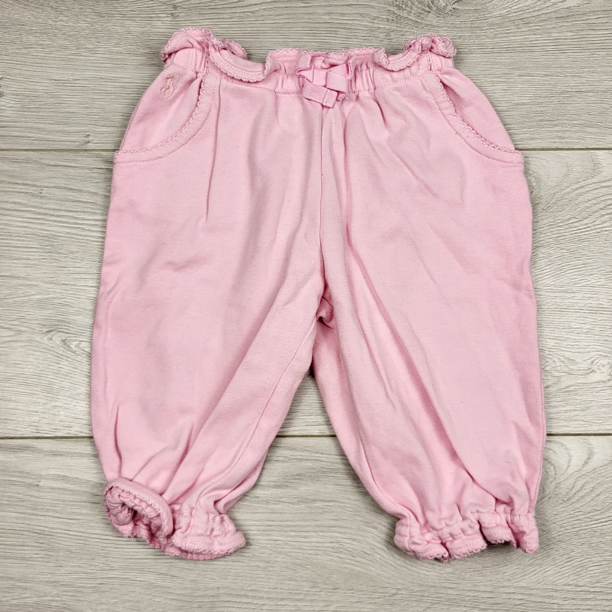 BBIN11 - Ralph Lauren pink cotton pants with ruffled waist. Size 9 months