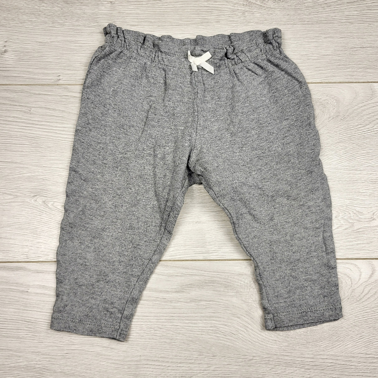 BBIN12 - Child of Mine grey cotton pants with ruffled waist. Size 6-9 months