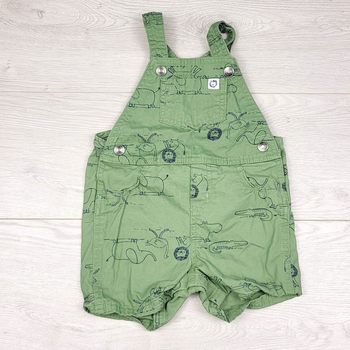 TBOW2 - Carters green twill shortalls with jungle animals. Size 18 months