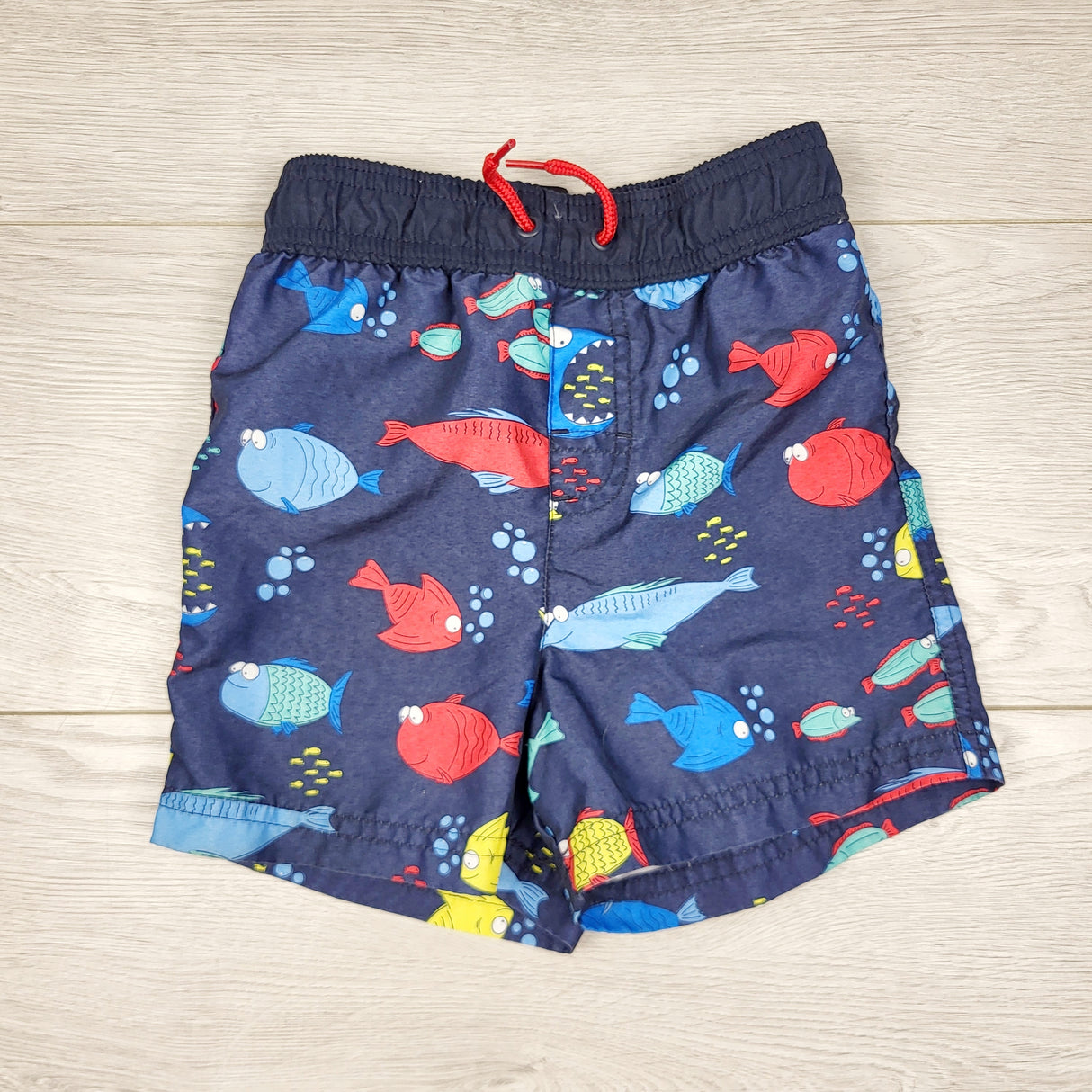 TBOW2 - George navy mesh lined swim shorts with fish. Size 18-24 months