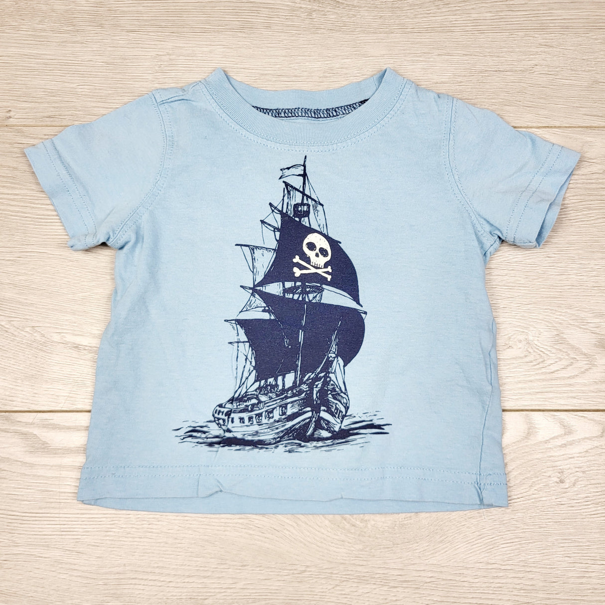 TBOW2 - Carters light blue t-shirt with pirate ship. Size 6 months