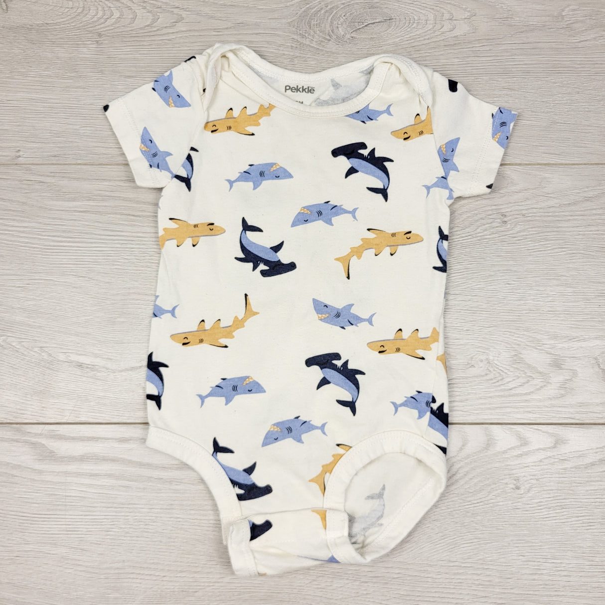 TBOW2 - Pekkle white bodysuit with sharks. Size 9 months