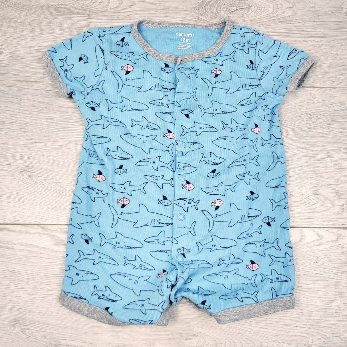 TBOW2 - Carters blue cotton romper with sharks. Size 12 months