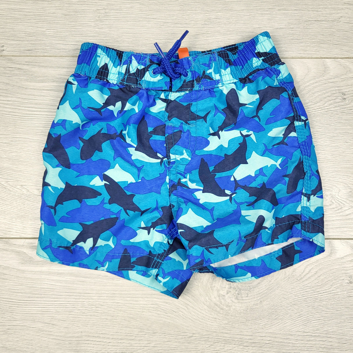 TBOW2 - Joe blue swim shorts with sharks. Size 6-12 months