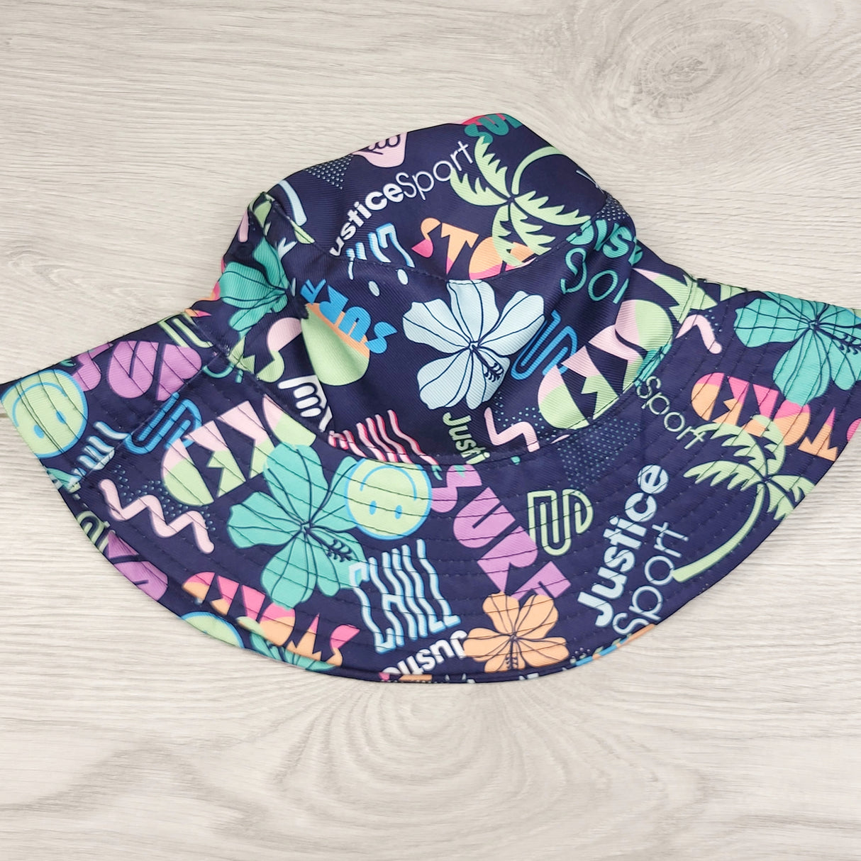 CKFT1 - Justice navy patterned bucket hat. One size fits all