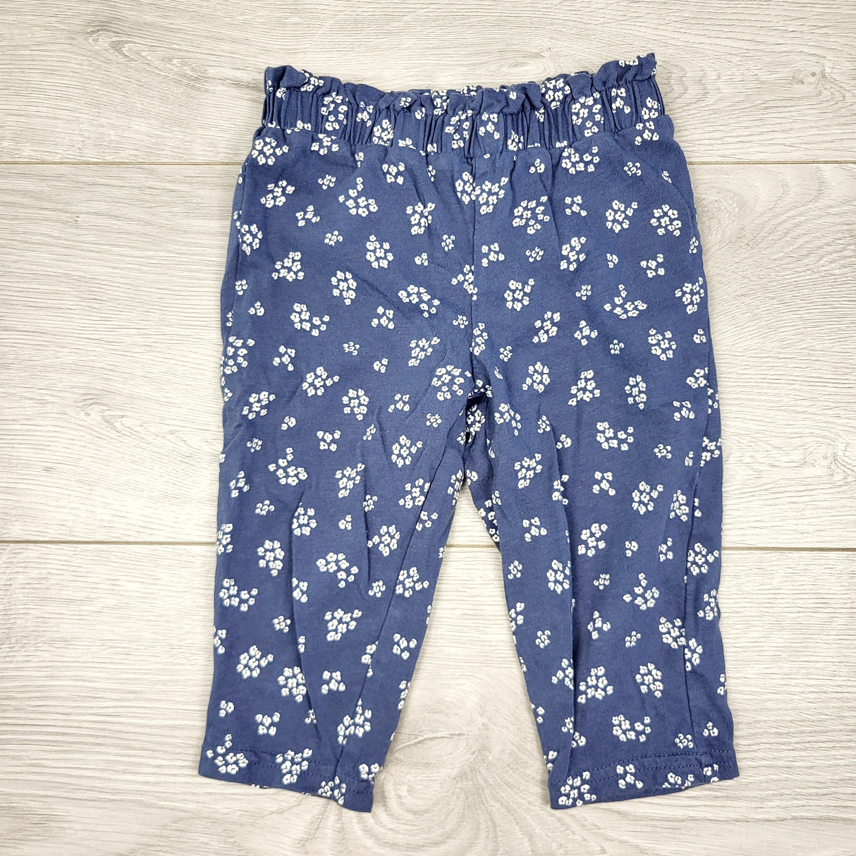 CAAC1 - Carters blue floral print cotton pants with ruffle waist. Size 9 months