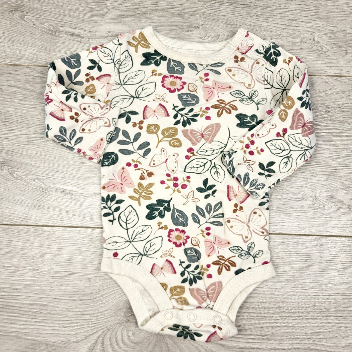 CAAC1 - Little Planet off white floral print bodysuit. Size 6 months