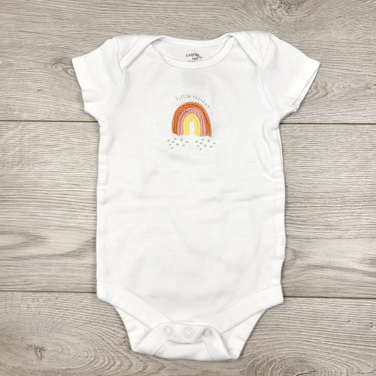 CAAC1 - George white bodysuit with rainbow. Size 3-6 months