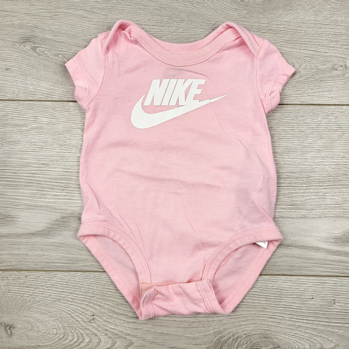 CAAC1 - Nike pink bodysuit. Size 3 months