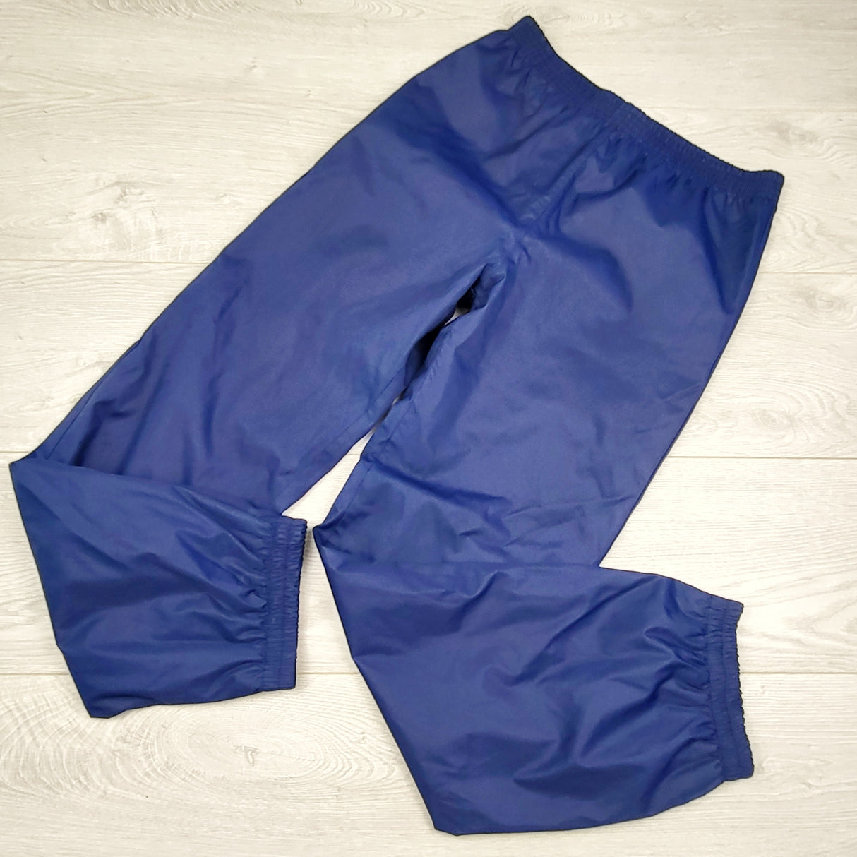 RHW1 - Navy jersey lined rain pants. Size 10/12