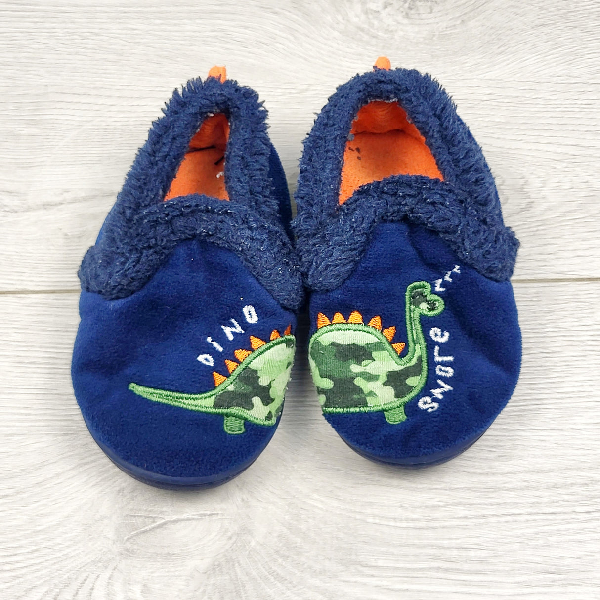 RUBH2 - Navy plush dinosaur slippers with rubber soles. Size 5/6