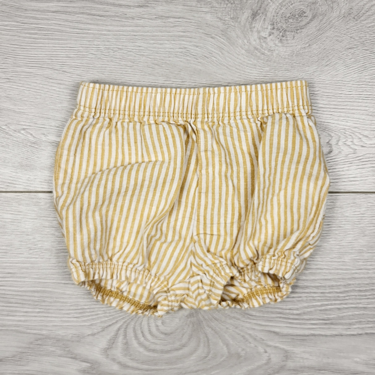 DMKY2 - Carters yellow striped shorts. Size 6 months