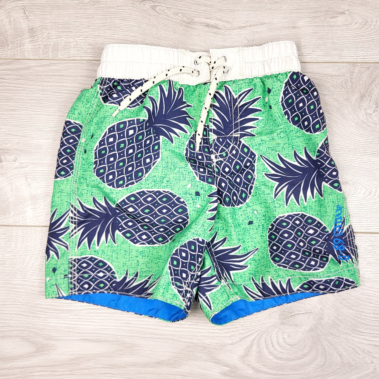 KLJ1 - Gap pineapple swim shorts. Size 3T