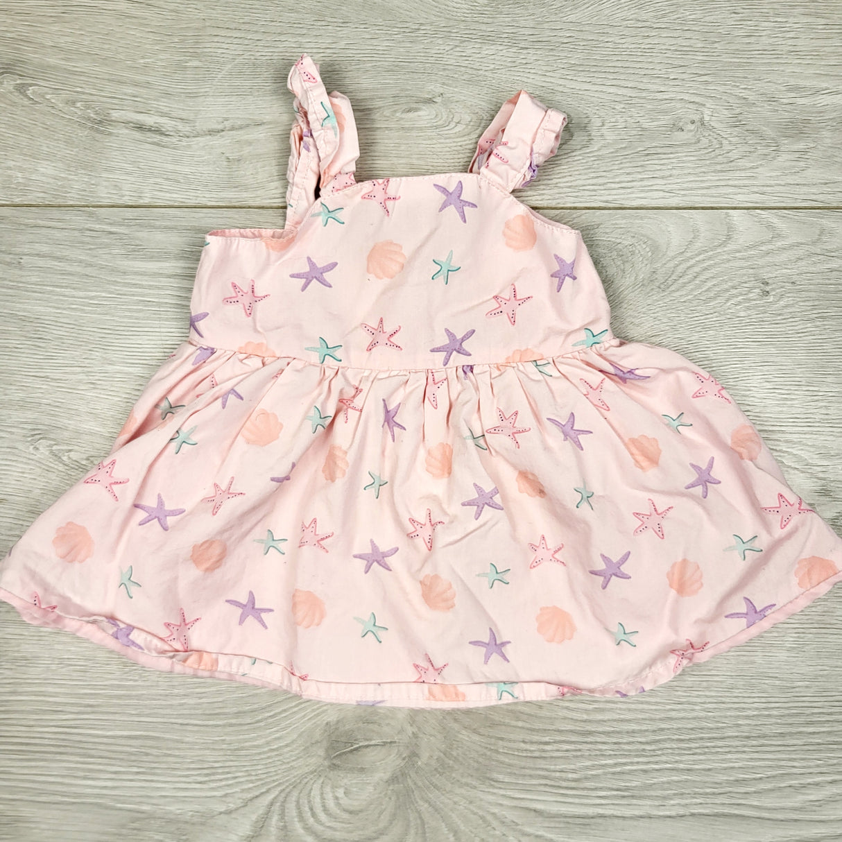 CAAC2 - Primark pink dress with seashells and sea stars. Size 0-3 months