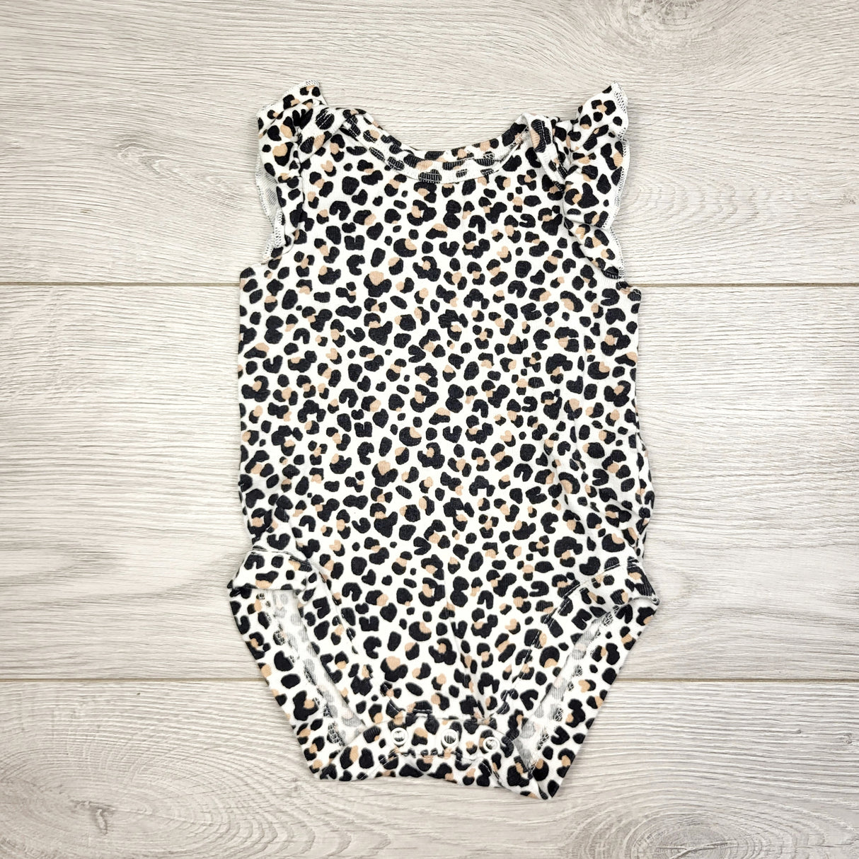 CAAC2 - Baby Place leopard print bodysuit. Size 0-3 months