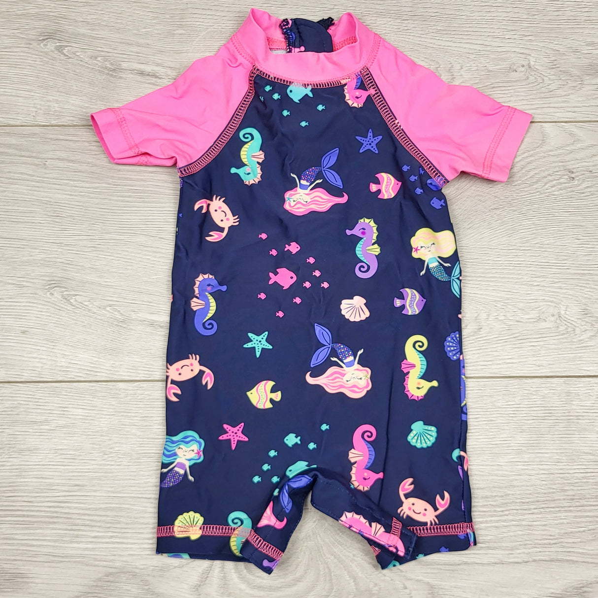 ECRS1 - George navy and pink ocean themed one piece rash guard. Size 3-6 months