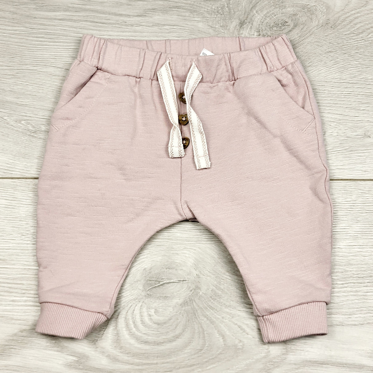 KSAL2 - Anko pink cotton joggers. Newborn size