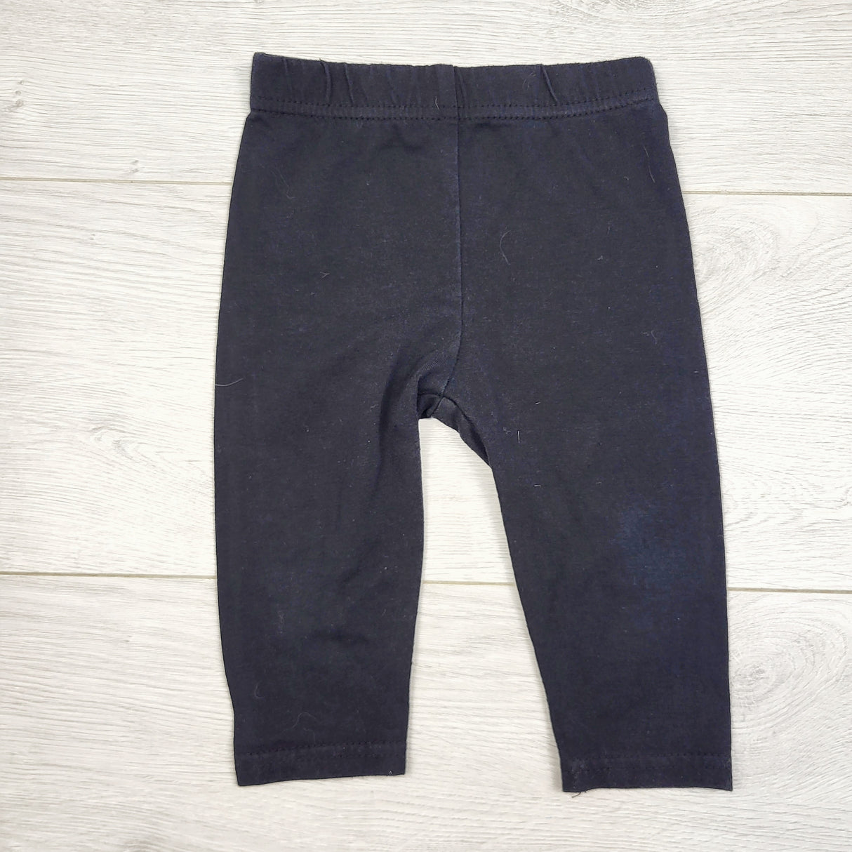 ECRS33 - Black cotton leggings. Size 12 months